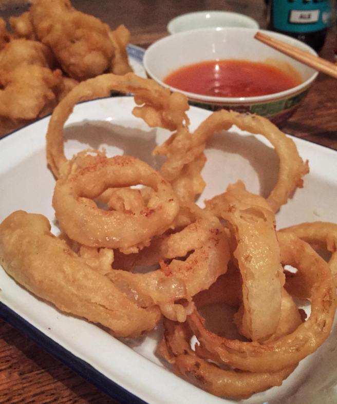 Beer-battered onion rings and sweet & sour chicken balls (Chinese takeaway style)
