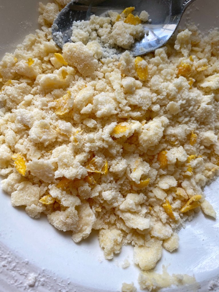 Make the crumble: Add caster sugar, self-raising flour, butter and lemon zest into a bowl, rub together with your fingertips until the mixture resembles crumbs.